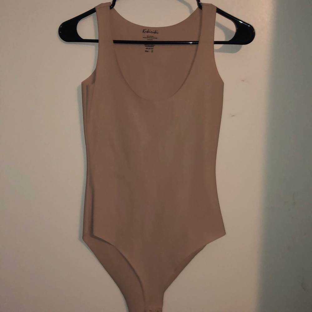 nude bodysuit..never been worn, tag came off